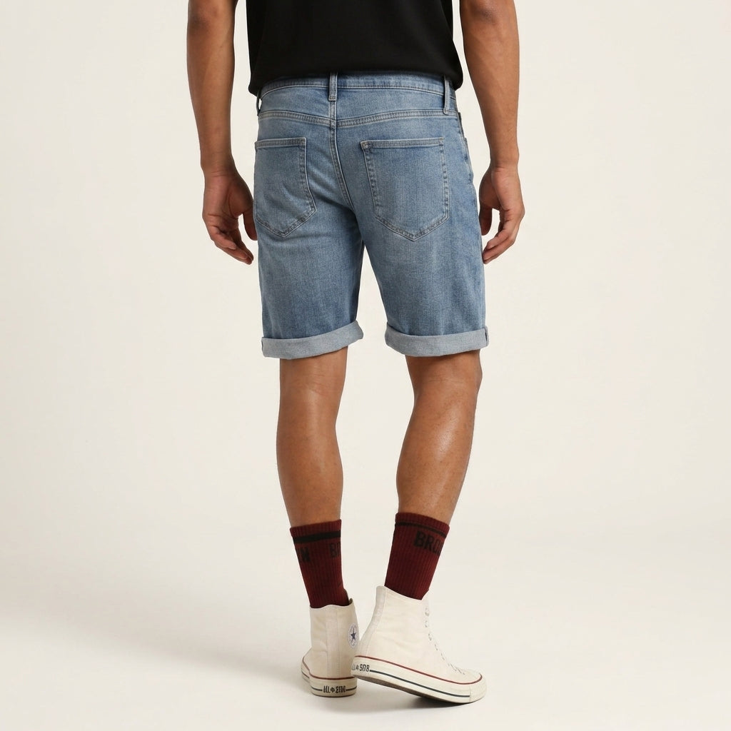 Men's cotton-blend denim shorts displayed in a casual flat lay