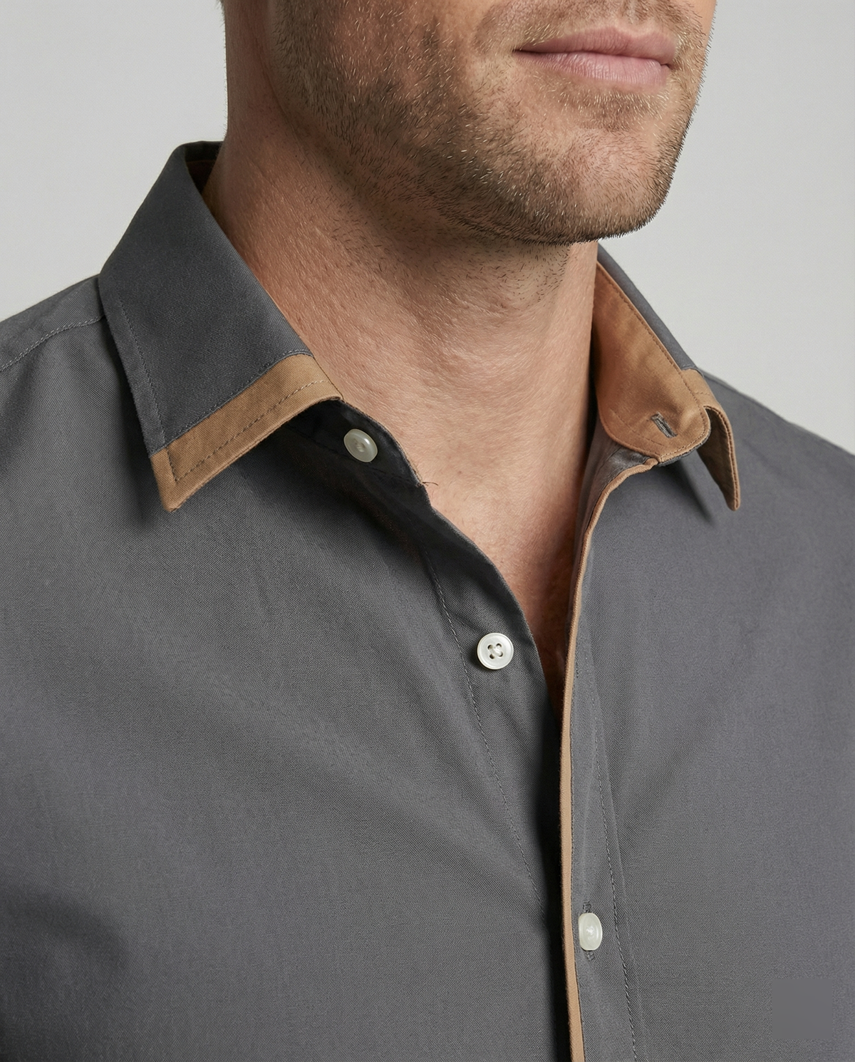 Men's button-down shirt displaying its classic collar and front buttons