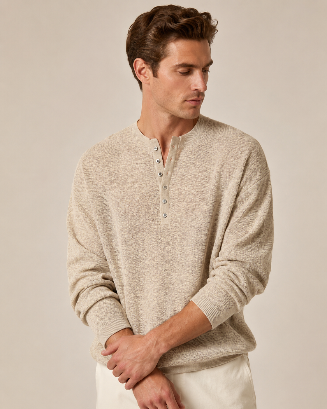 Detail view of the henley shirt's buttons and neckline