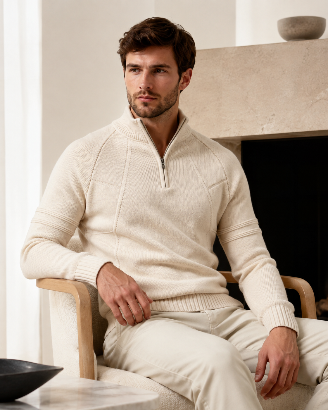 Men's knit sweater displayed with the front zip partially open
