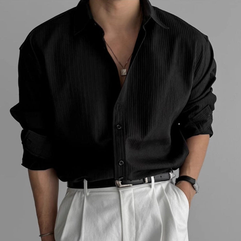 Front view of a men's pleated shirt in a clean minimalist style