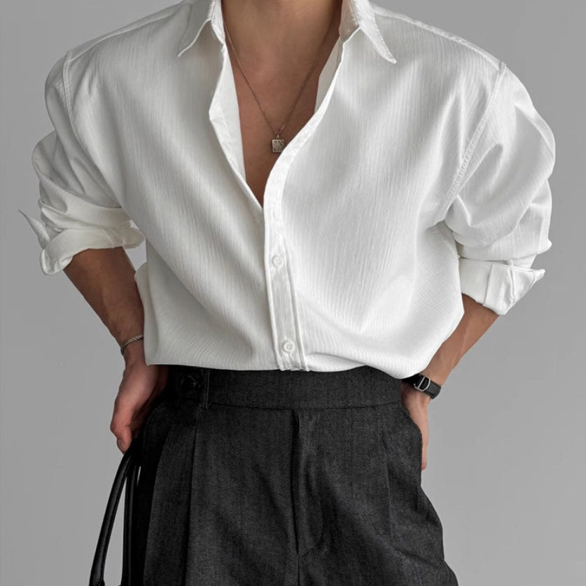 Men's pleated shirt showing its lightweight fabric and relaxed shape