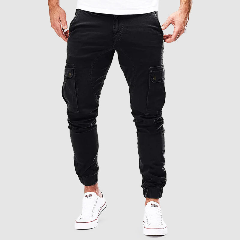Close-up of men's tactical pants fabric and utility pockets