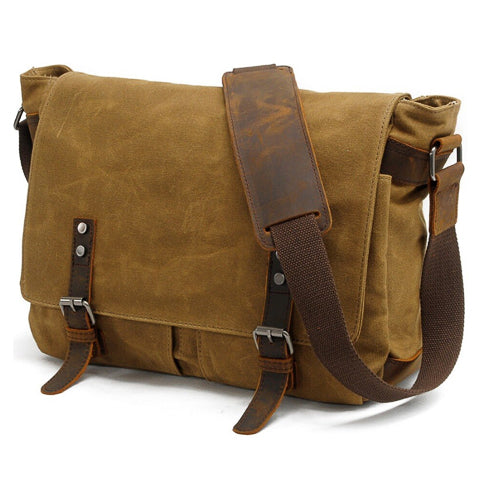 Men's vintage crossbody bag angled view showing compact shape and retro styling