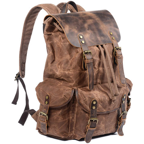 25L vintage canvas backpack showing main compartment and front pockets