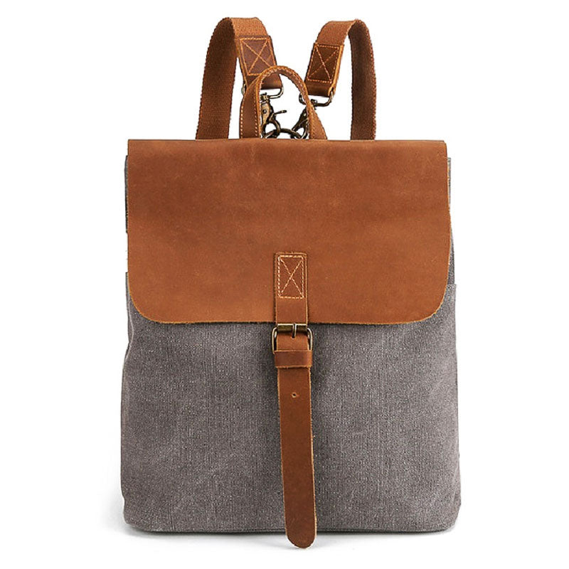 Open vintage square backpack displaying the main compartment interior