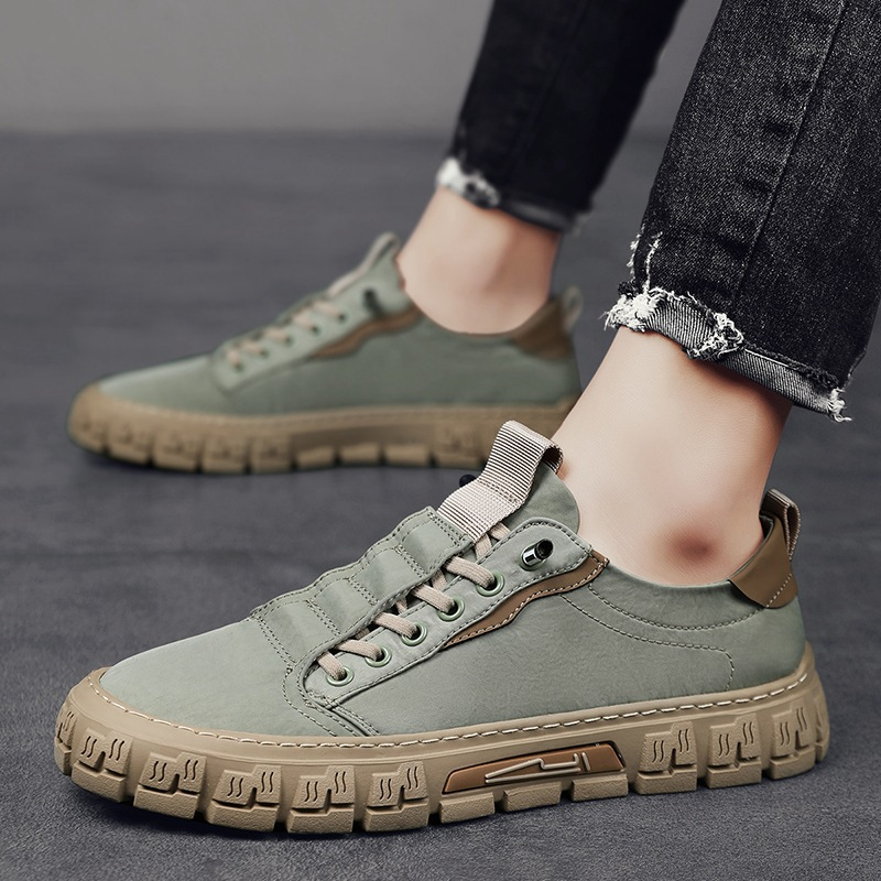 Pair of men's canvas sneakers shown from a three-quarter angle