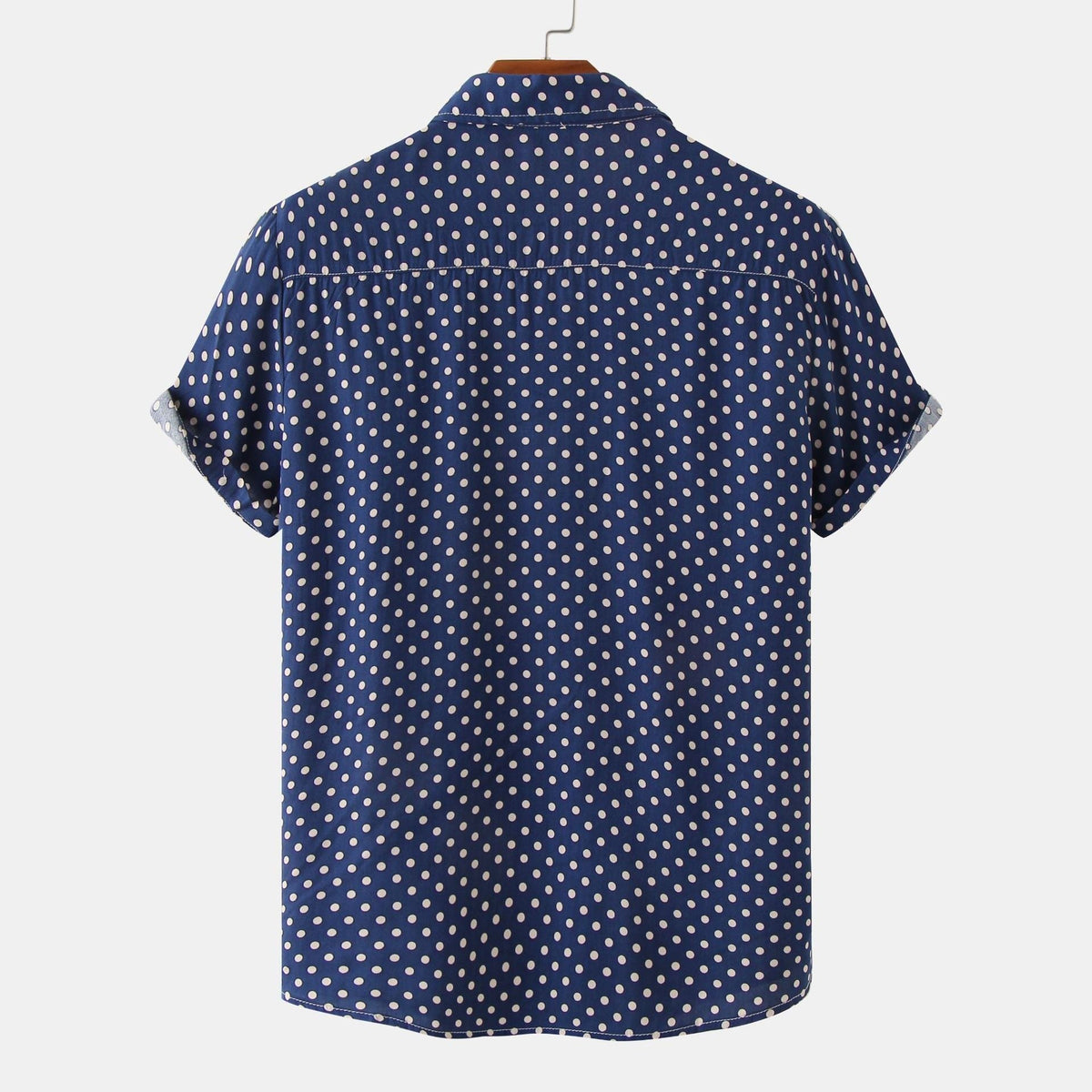 Close-up of the dot pattern on a men's short-sleeve shirt