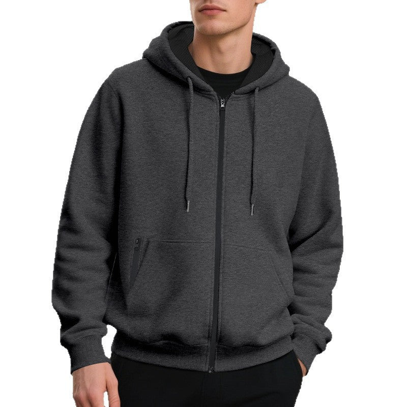 Men's hoodie showing ribbed cuffs and a relaxed fit