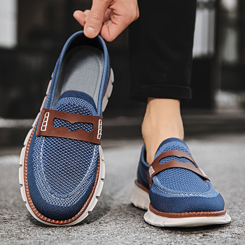 Side profile showing the mesh upper of men's loafers