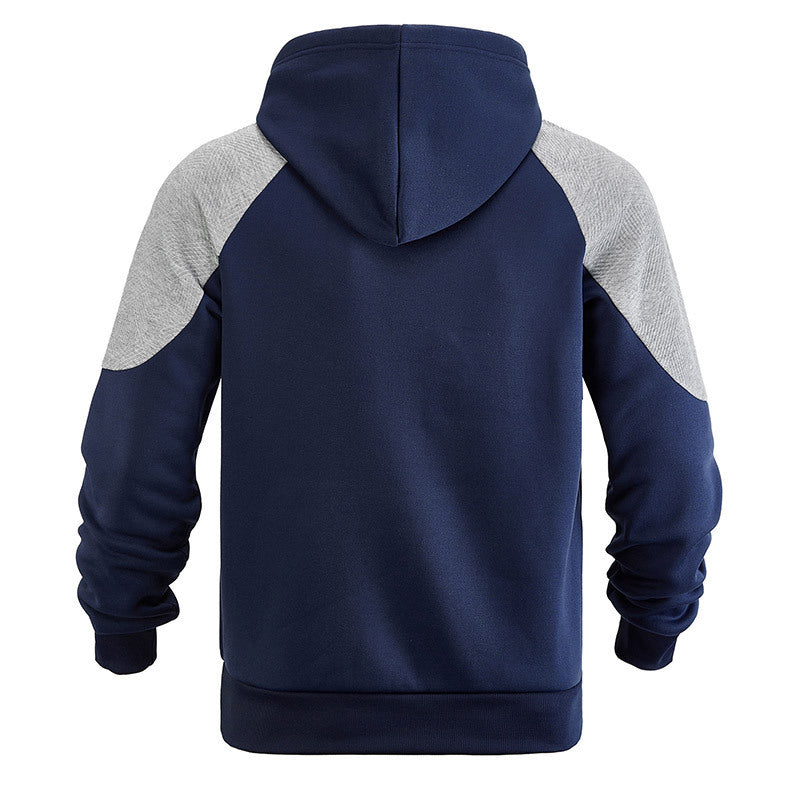 Kangaroo pocket detail on a men's textured panel hoodie