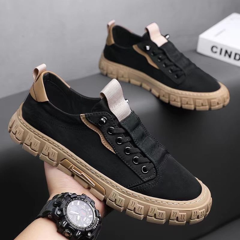 Outsole view of men's sneakers with a textured rubber tread