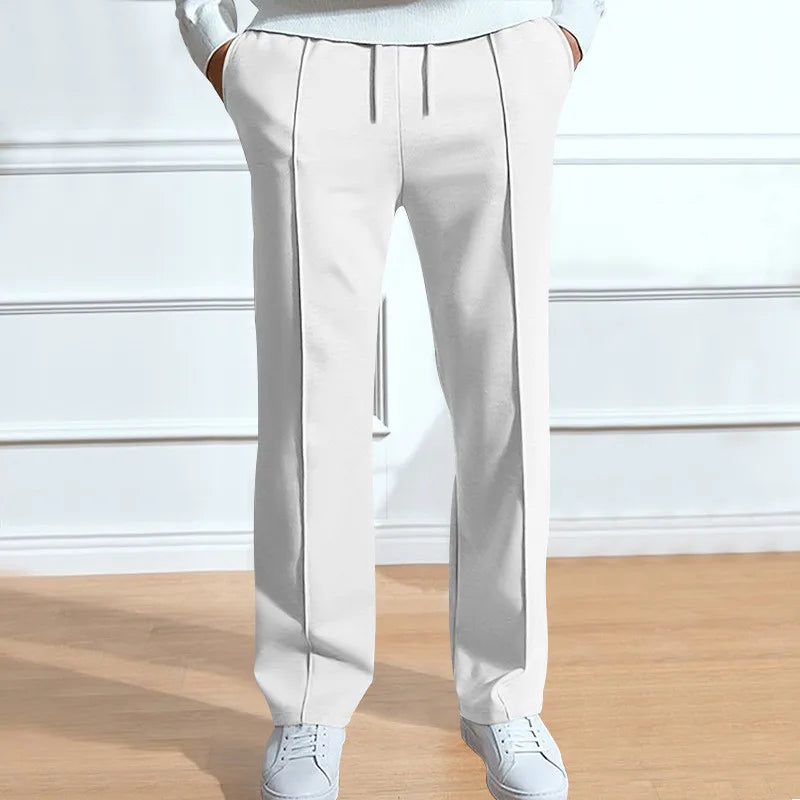 Full view of men's slim-fit trousers styled for everyday wear