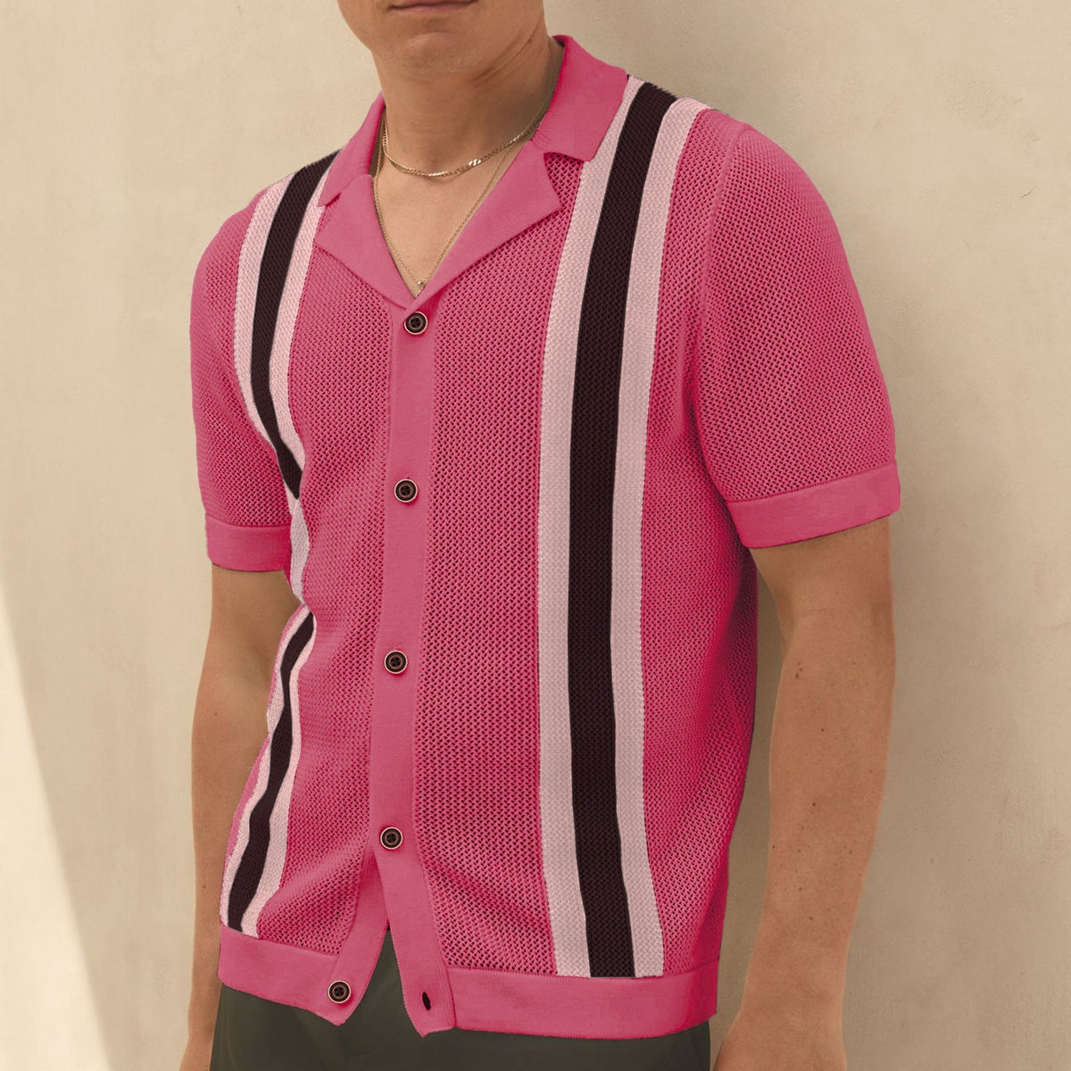 Front view of a men's short-sleeve knitted cardigan with a Cuban collar