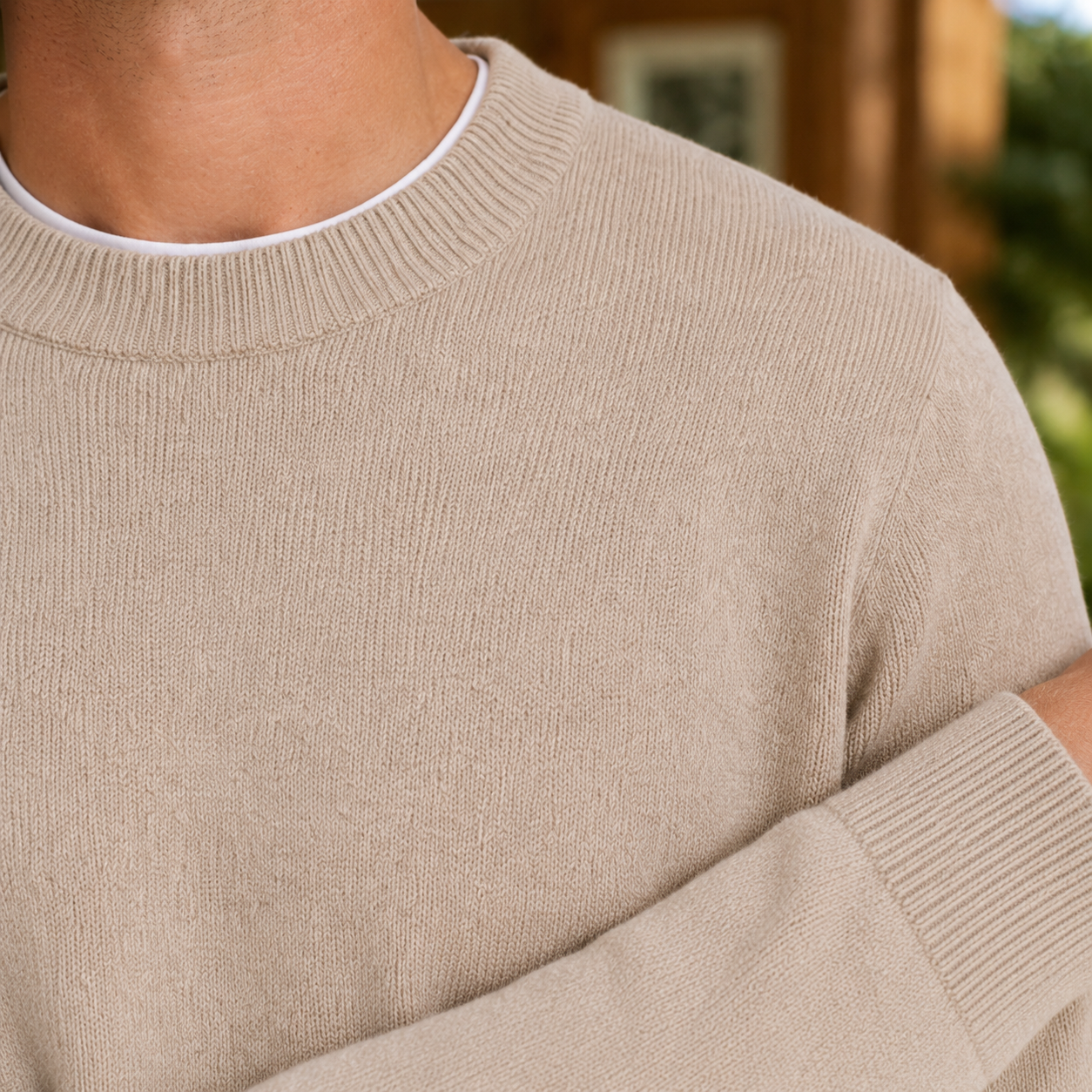 Men's wool sweater shown from the back with a clean, classic fit