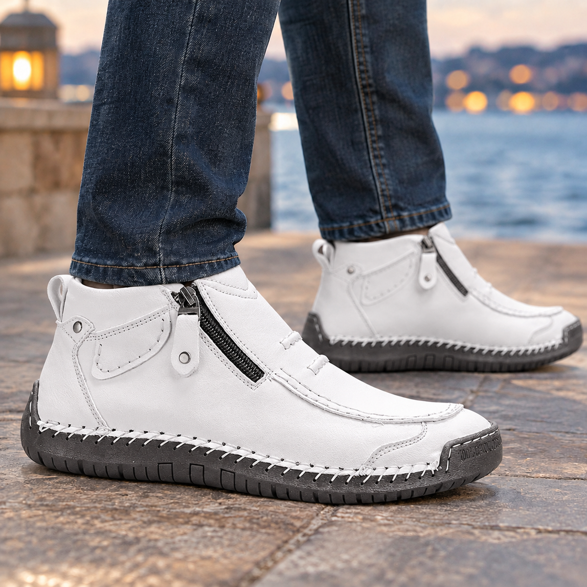 Close-up of the side zip on a men's ankle boot
