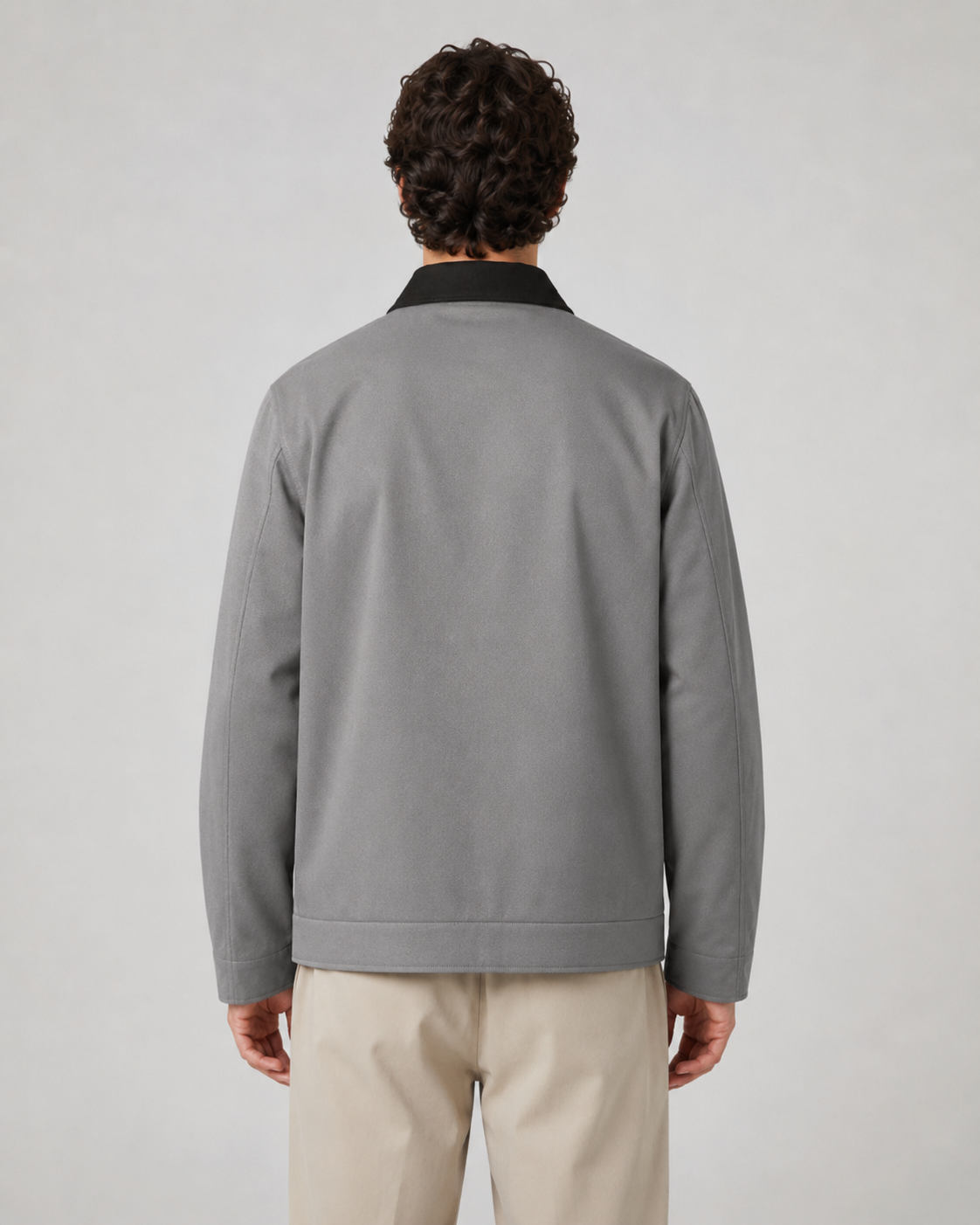 Close-up of the jacket's contrasting collar and zip front