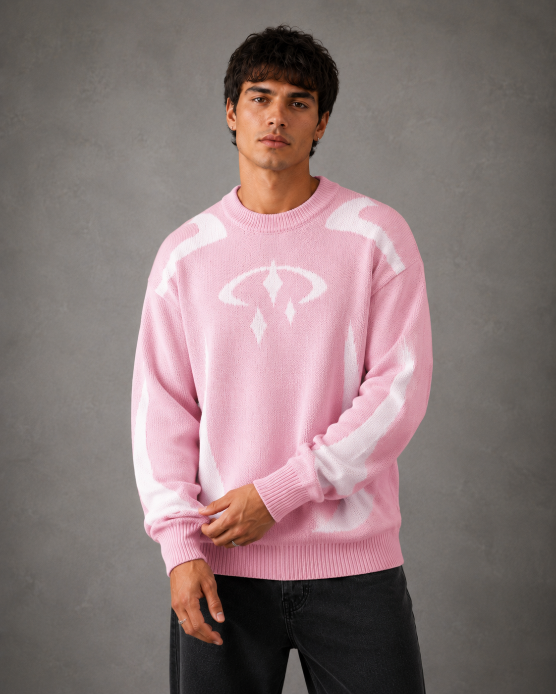 Full-length view of a men's graphic knit sweater outfit