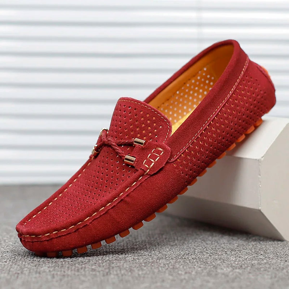 Close-up of the loafer vamp and perforated suede detailing