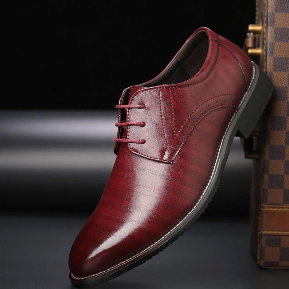 Men's lace-up brogue dress shoes shown from the front