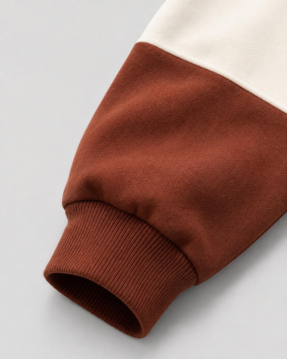 Side view of a men's relaxed-fit rugby polo sweater