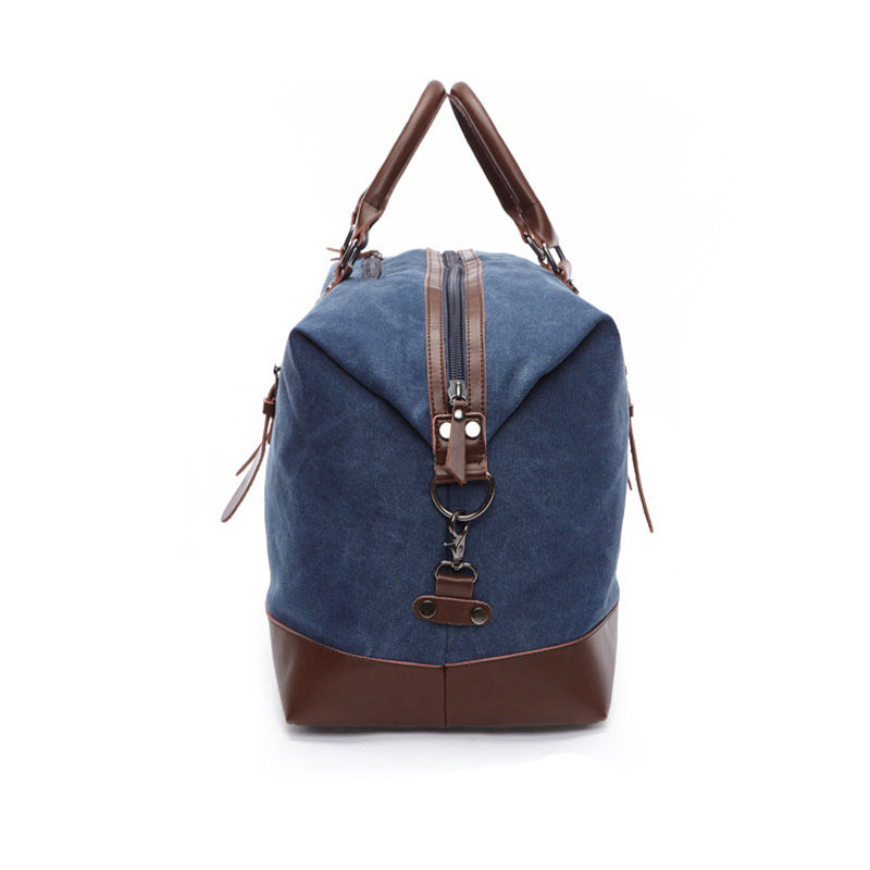 Open vintage duffle bag in leather and canvas showing spacious interior for travel and work essentials