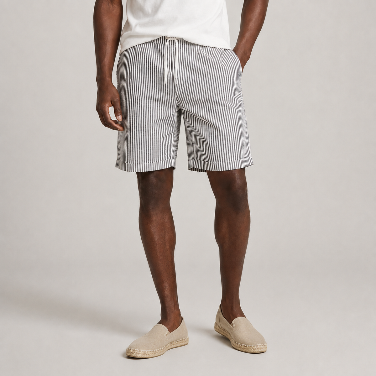 Men's striped shorts with a drawstring waist shown from the front