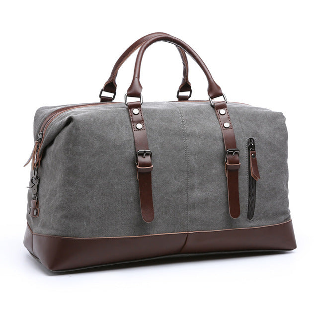 Vintage canvas and leather duffle bag with sturdy handles for travel and work