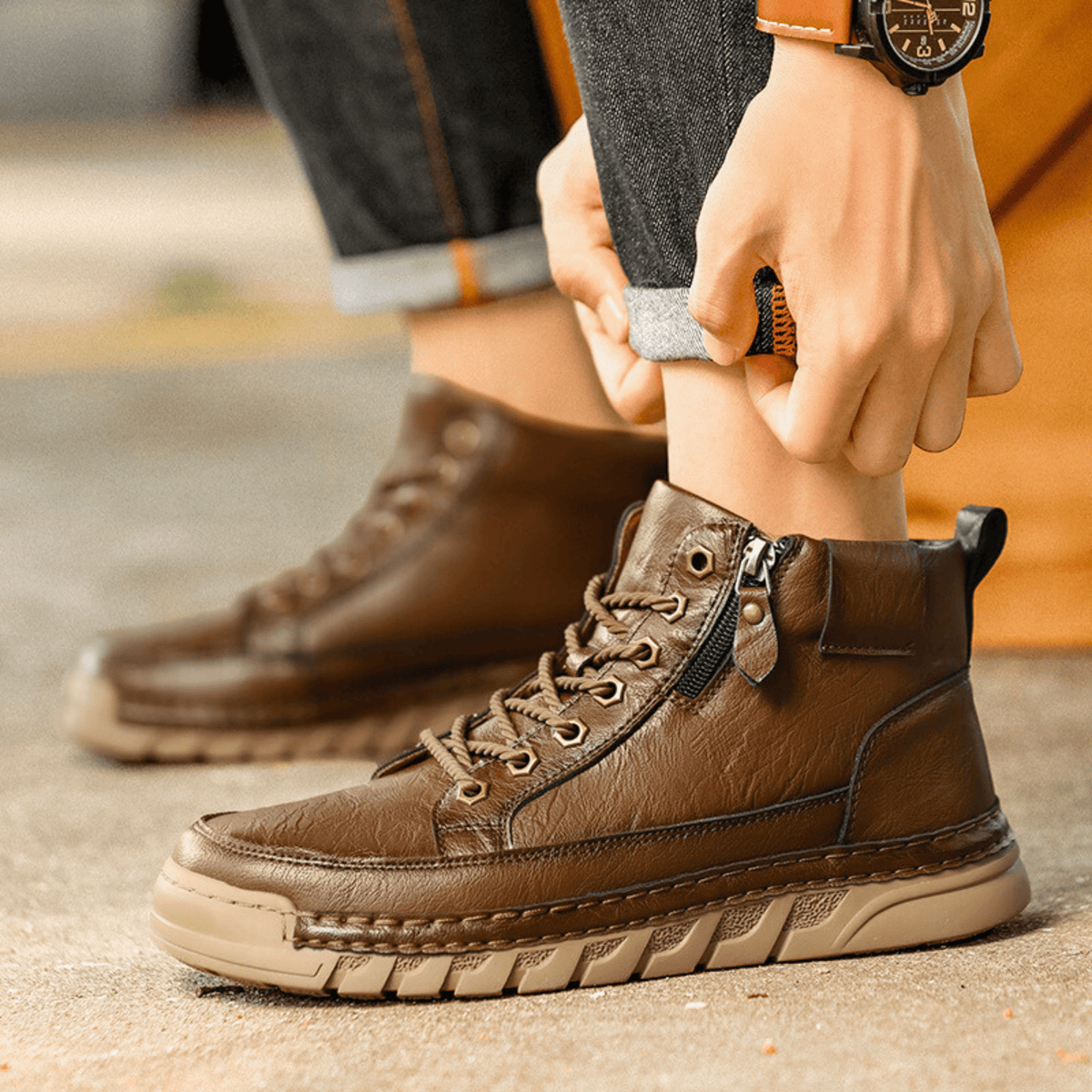 Close-up of the stitching on a leather men's boot