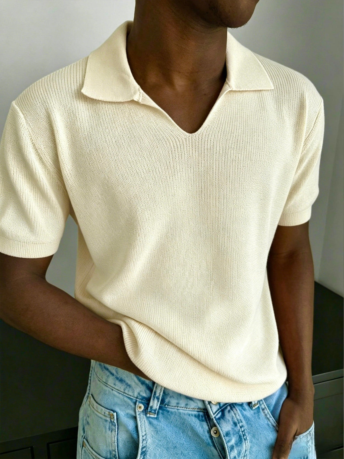 Men's ribbed polo shirt with an open V-neck shown from the front