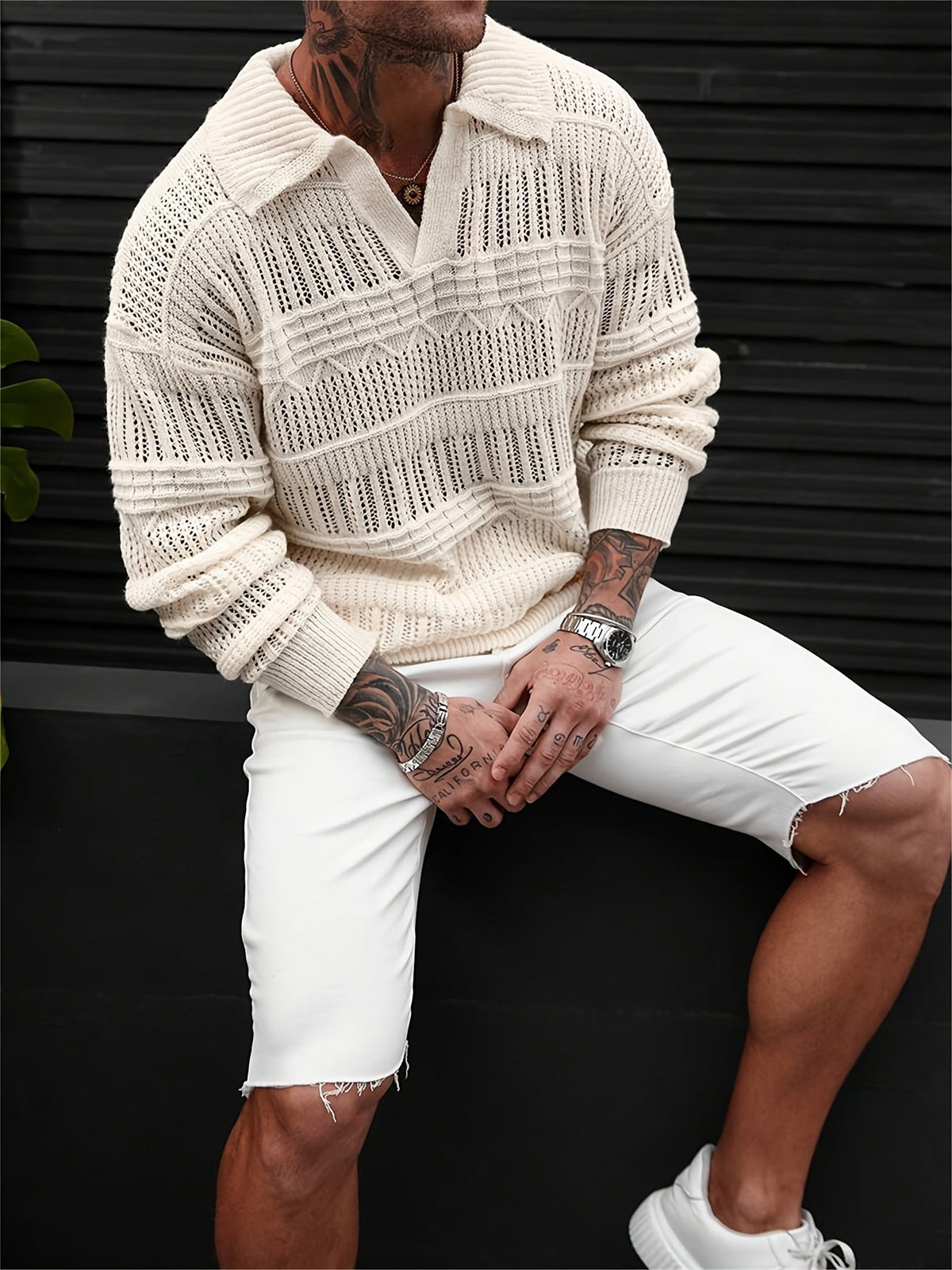 Close-up of the open-knit texture on a men's polo shirt