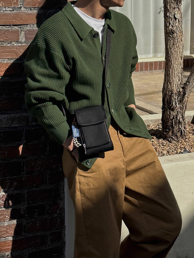 Men's cardigan featuring a pointed collar and button-front closure