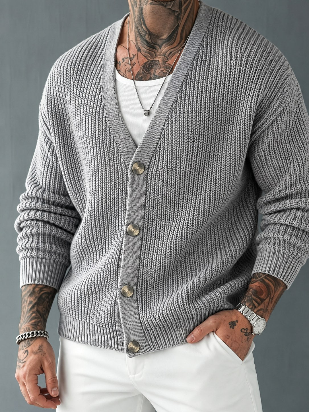 Close-up of the ribbed knit texture on a men's cardigan sweater