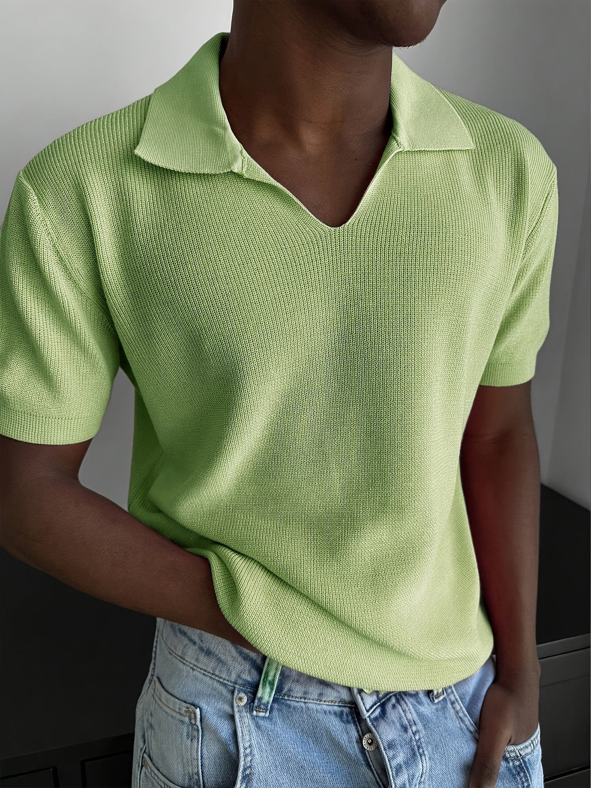 Men's ribbed polo shirt styled for a polished casual look