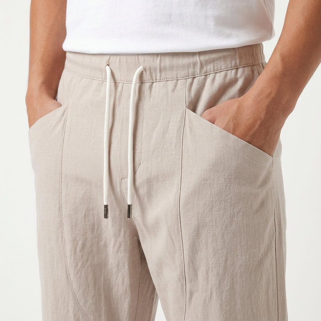 Close-up of the cotton-linen fabric and cropped hem on men's pants