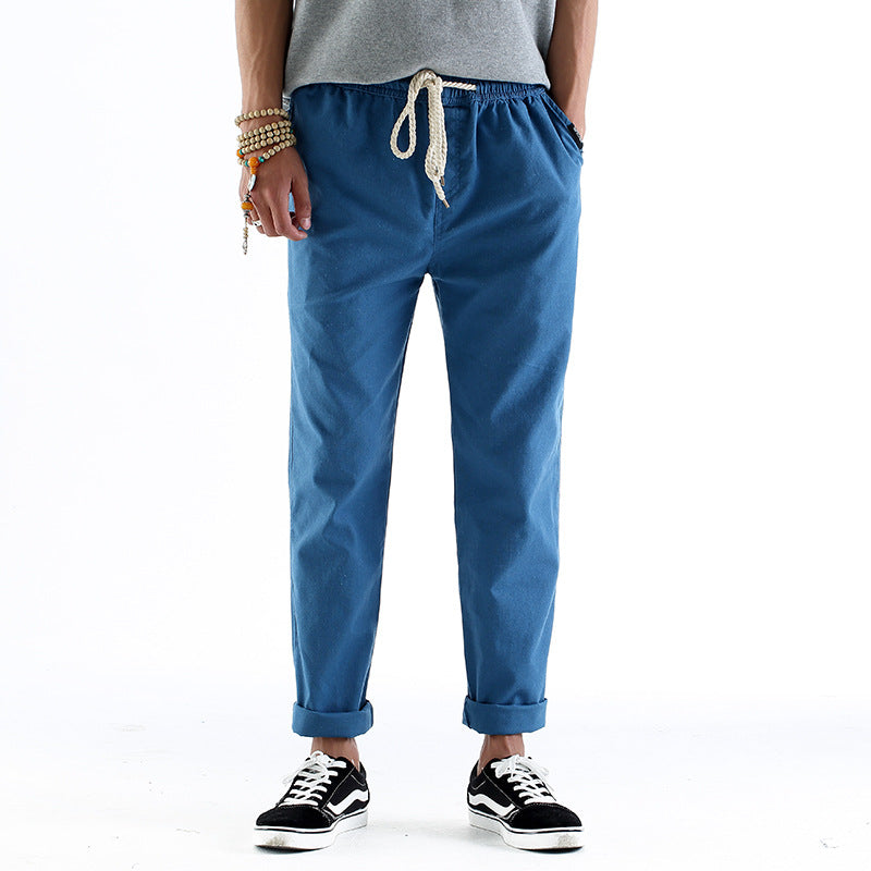 Side view showing the straight-leg cut of men's pants