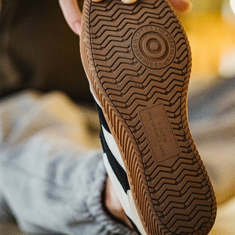 Men's sneakers showing the EVA sole profile