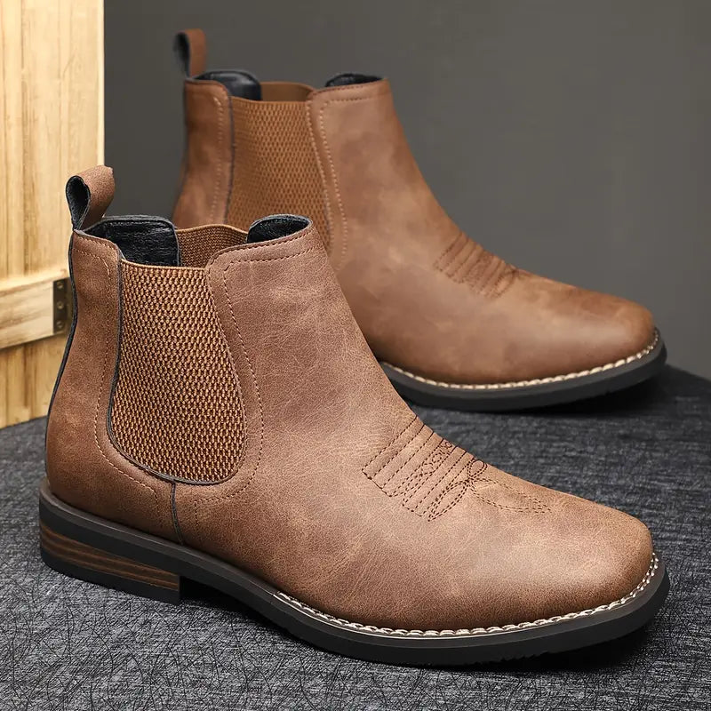 Rear view of men's leather boots and heel design
