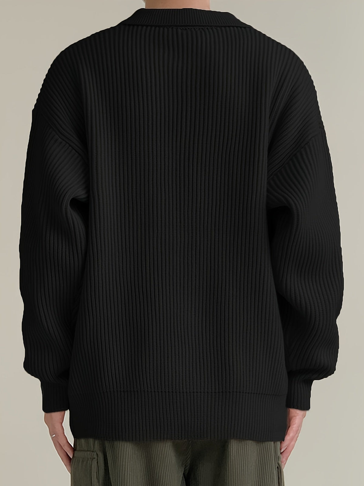 Men's cardigan showing the button-front design and ribbed texture