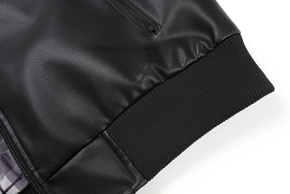 A close-up of a  Black Quilted Faux Leather Moto Jacket