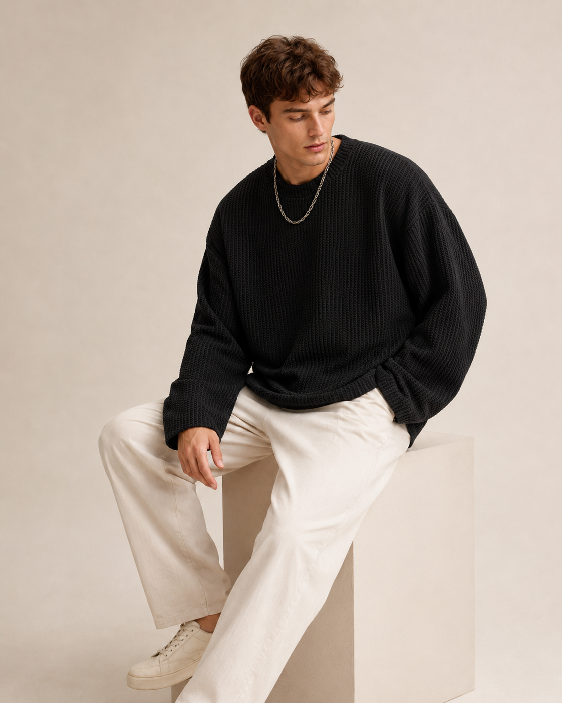 Close-up view of the sweater's waffle knit texture