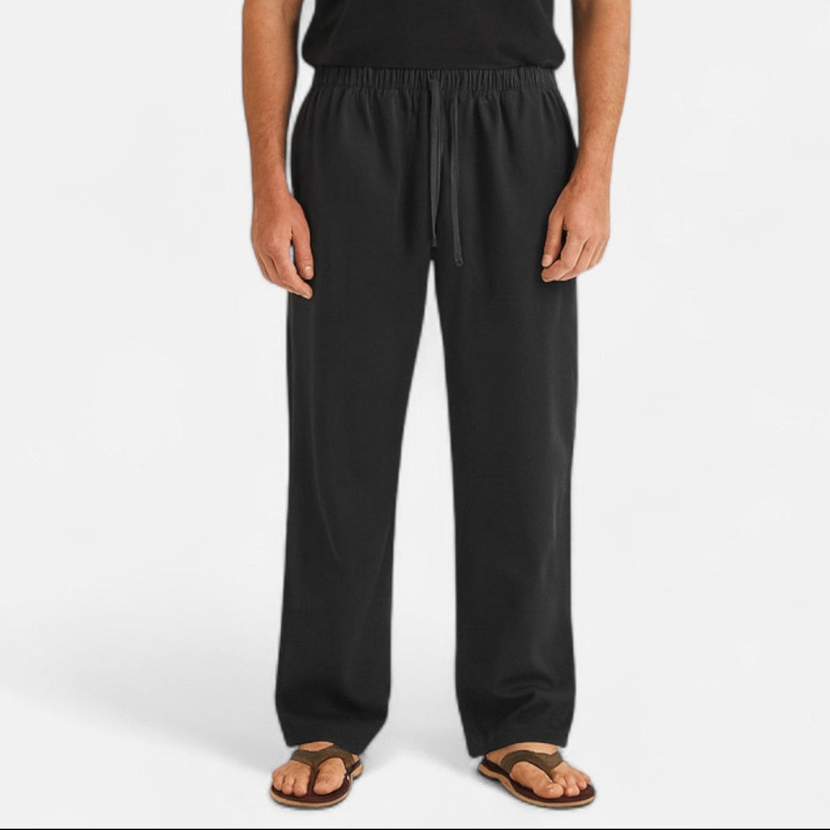 Men's lightweight relaxed pants with a wide-leg fit shown from the front