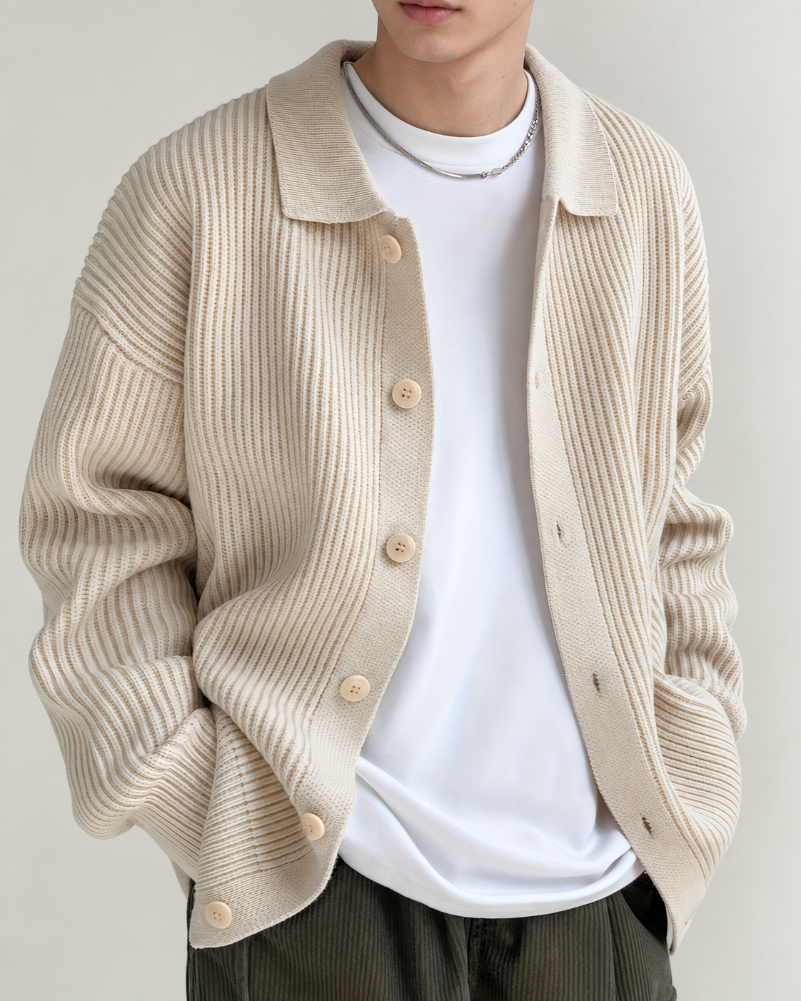 Men's ribbed cardigan styled as an everyday layering piece