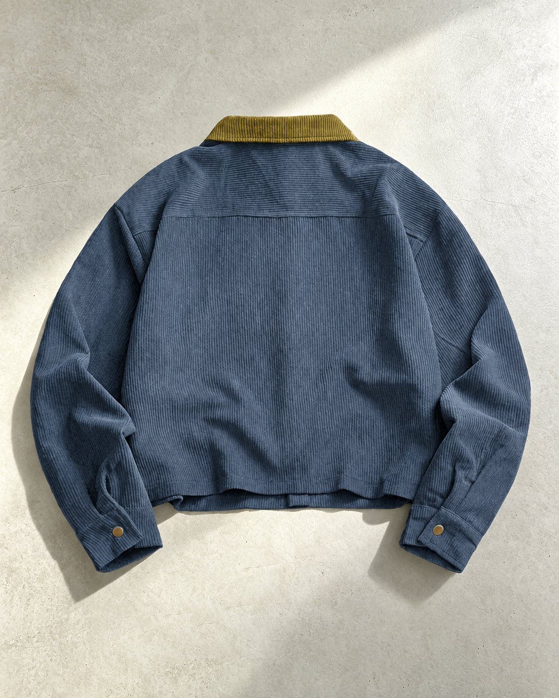 Men's corduroy shirt jacket paired with casual clothing for everyday wear.