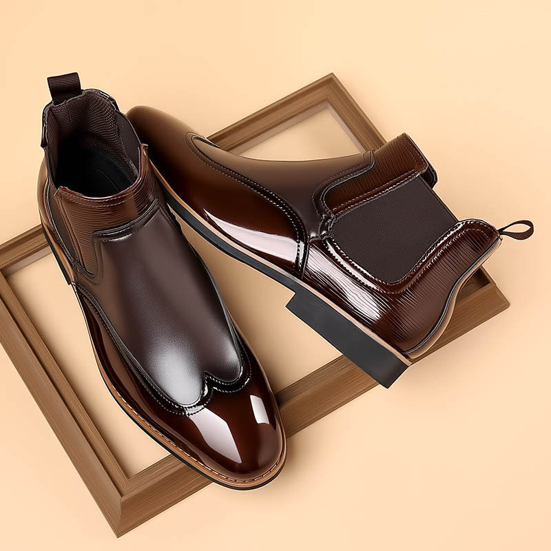 Side view of classic men's Chelsea boots with elastic panels