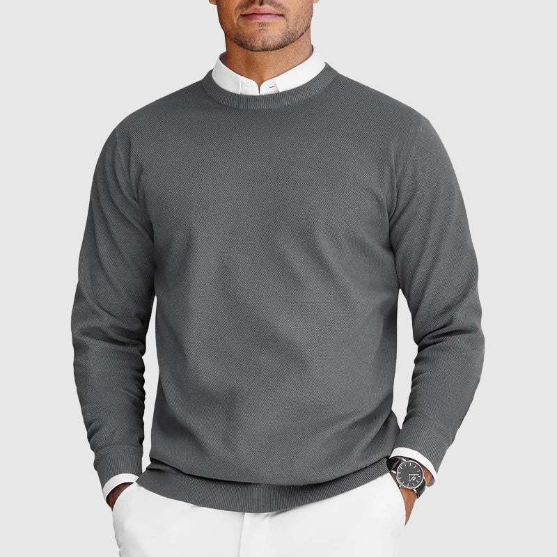 Side view of a men's slim-fit crew neck pullover