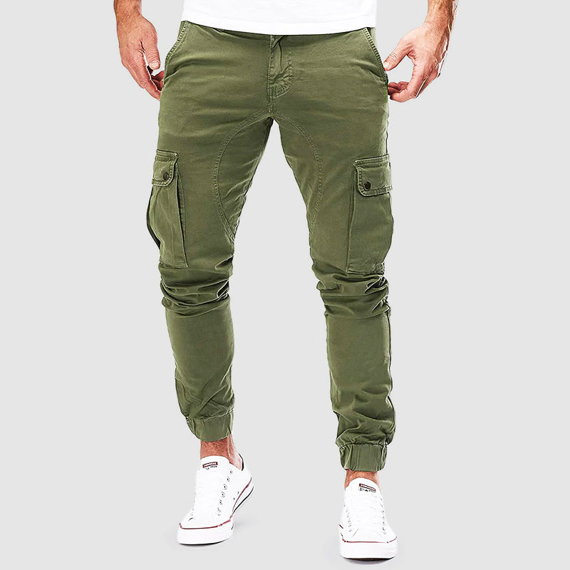 Men's tactical pants shown from the side with a slim fit