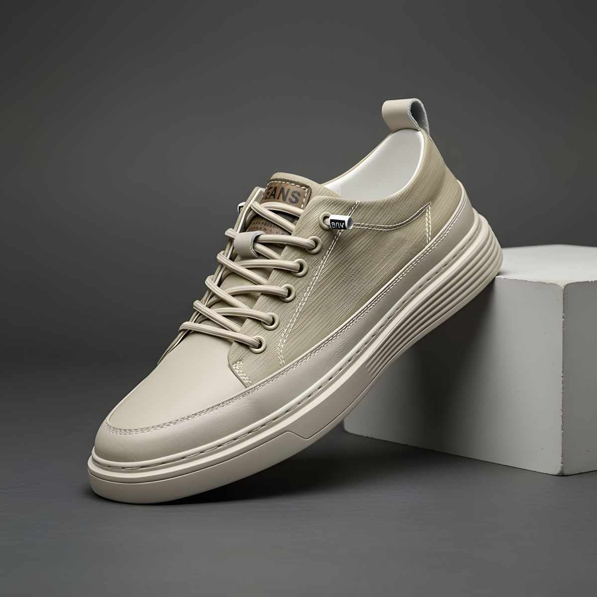 Men's leather sneakers photographed from a three-quarter angle
