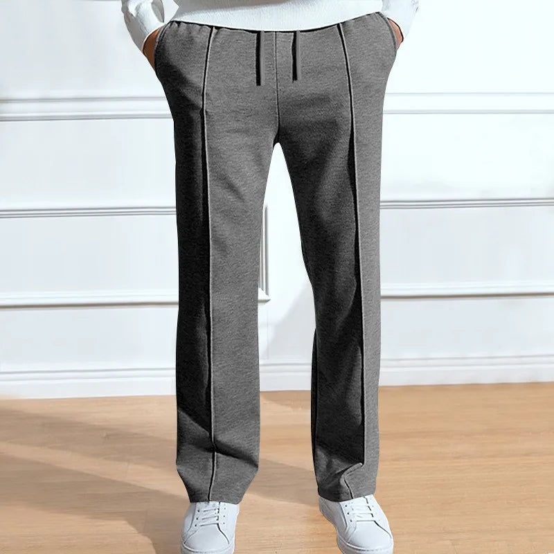 Men's slim-fit trousers displayed from the side to show their tailored shape