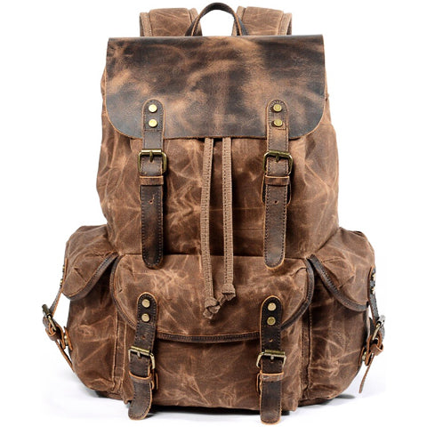 Vintage canvas travel backpack for men in a front angled view